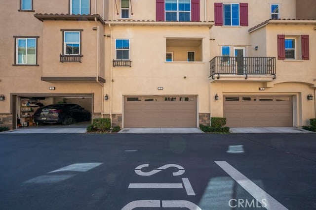 exterior space featuring an attached garage