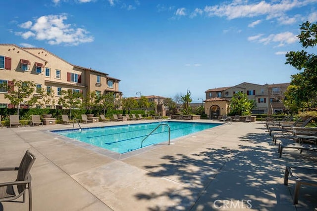 pool featuring a patio area