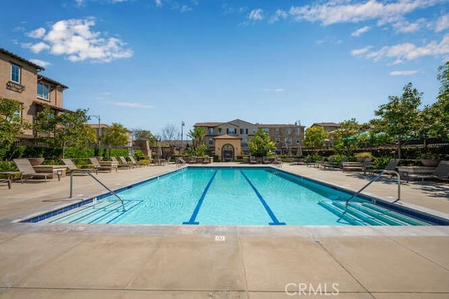 pool featuring a patio area