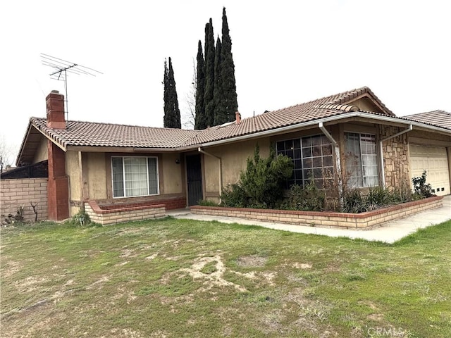 ranch-style house featuring stucco siding, a tiled roof, a garage, and a chimney