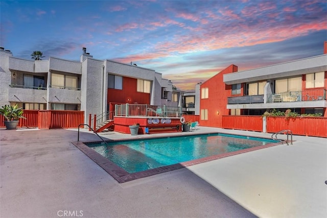 community pool with a patio