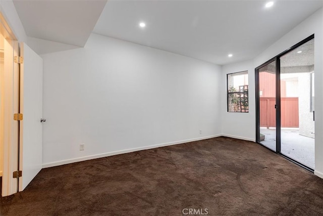 unfurnished bedroom featuring recessed lighting, baseboards, carpet, and access to outside