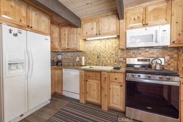 kitchen featuring backsplash, beam ceiling, dark wood-style floors, white appliances, and a sink