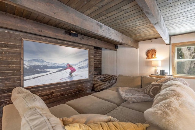 cinema room featuring beam ceiling and wood ceiling