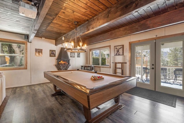 recreation room with beam ceiling, dark wood-style floors, french doors, wooden ceiling, and pool table