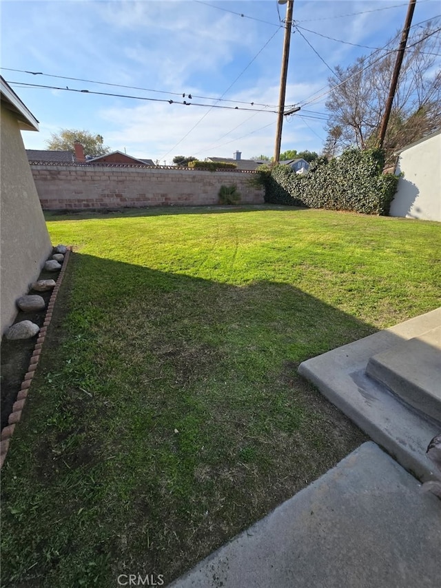 view of yard with fence