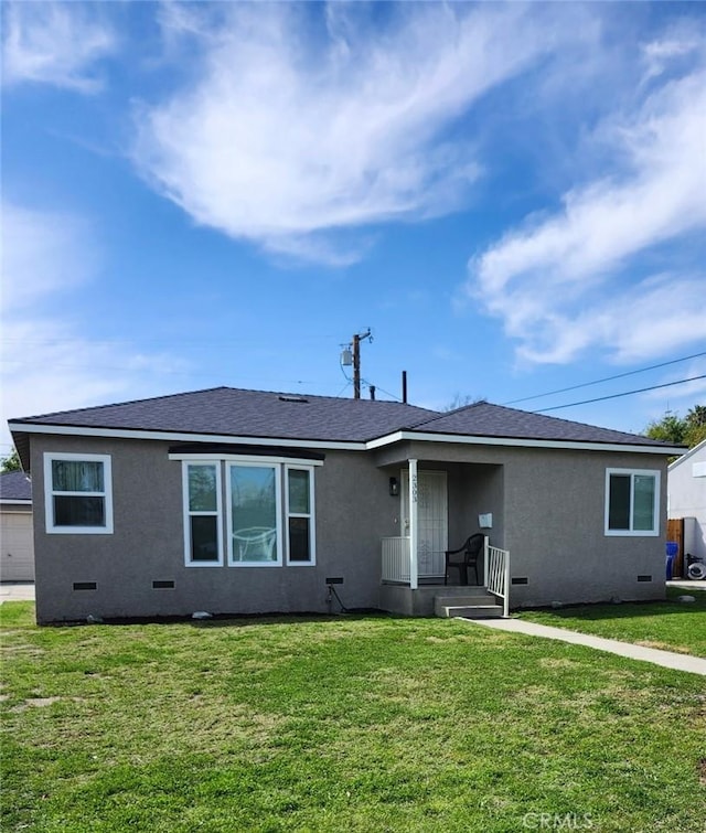 single story home with crawl space, stucco siding, and a front yard