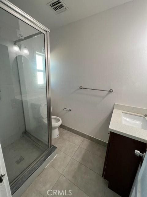 bathroom featuring visible vents, toilet, a shower stall, tile patterned flooring, and vanity