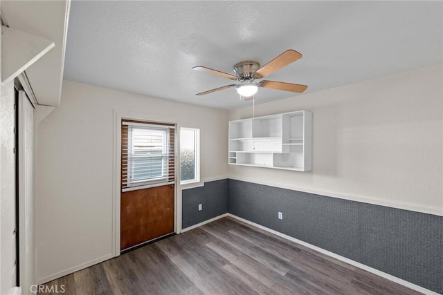 1429 14th St, Los Osos, CA 93402 - spare room with dark wood-type flooring, baseboards, and a ceiling fan