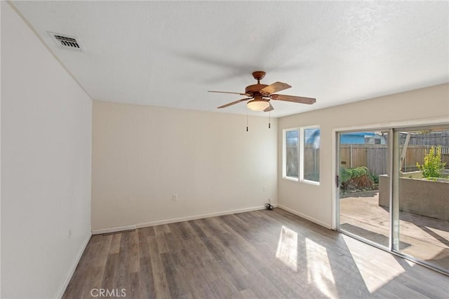 1429 14th St, Los Osos, CA 93402 - spare room with a healthy amount of sunlight, visible vents, and wood finished floors