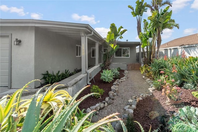 exterior space featuring stucco siding