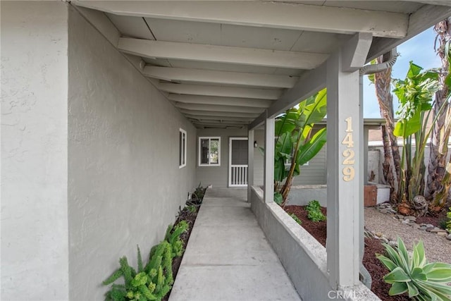 exterior space featuring stucco siding