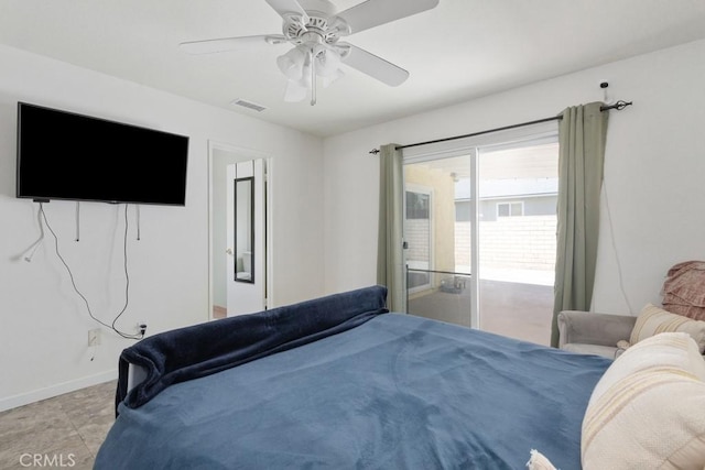 bedroom with visible vents, baseboards, and a ceiling fan