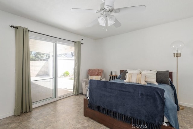 bedroom featuring baseboards, a ceiling fan, and access to outside