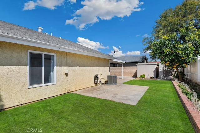 view of yard with central air condition unit, a patio, and a fenced backyard