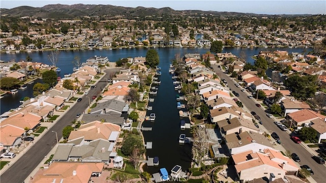 aerial view with a residential view and a water view