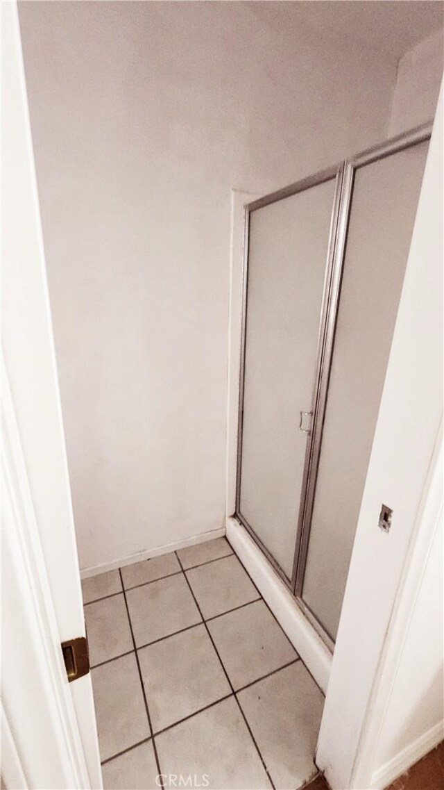 bathroom featuring tile patterned flooring