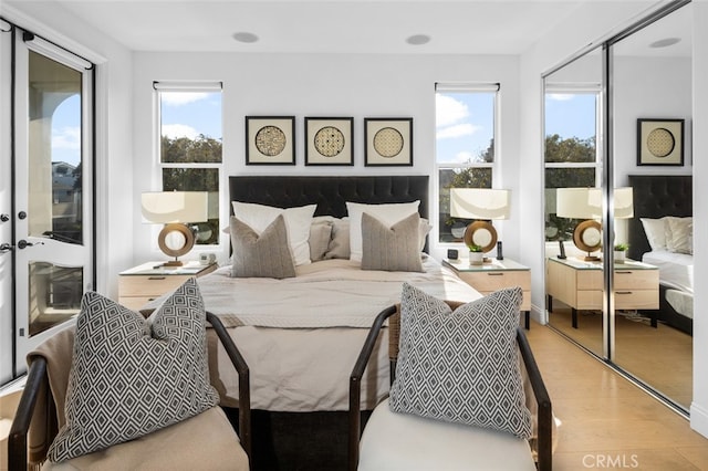 bedroom featuring light wood-style floors