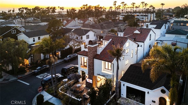 aerial view at dusk with a residential view