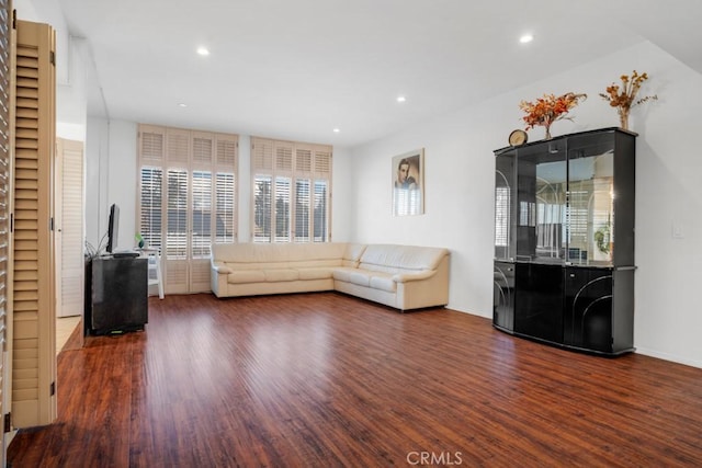 unfurnished living room featuring recessed lighting and wood finished floors