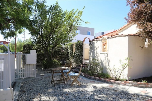 view of yard with a patio area and fence