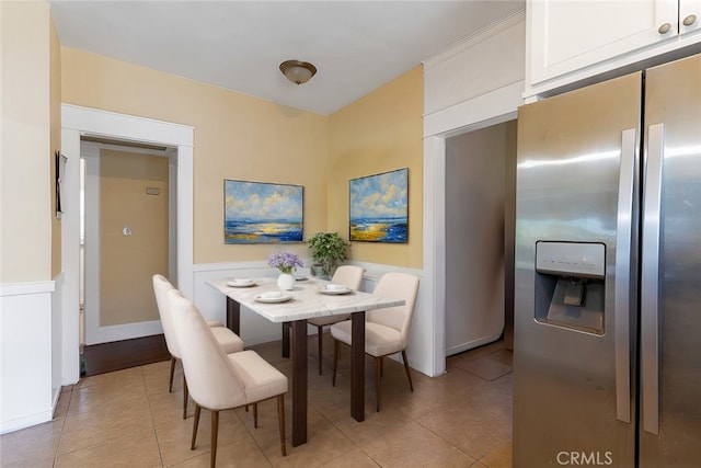 dining room featuring light tile patterned floors