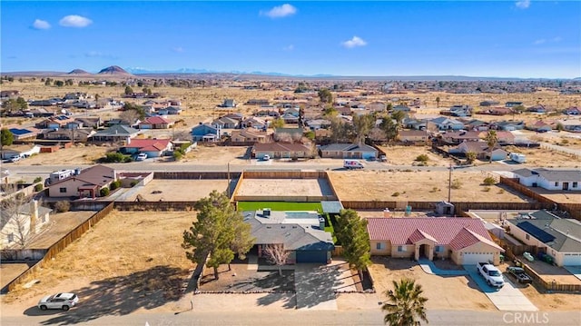 bird's eye view with a mountain view, a residential view, and a desert view