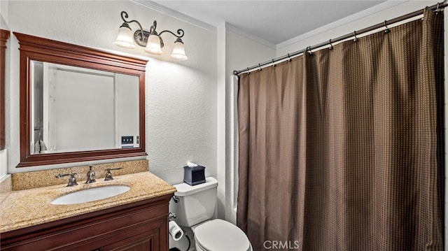 full bath featuring toilet, a shower with shower curtain, ornamental molding, a textured wall, and vanity