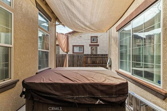 view of patio / terrace featuring fence