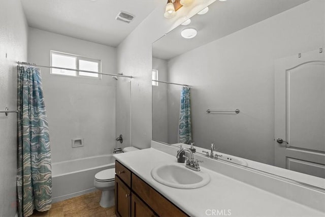 full bathroom with visible vents, toilet, vanity, and shower / bathtub combination with curtain