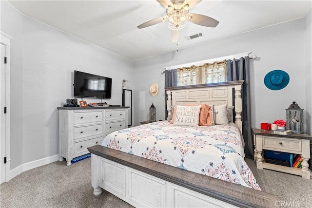 bedroom with visible vents, light colored carpet, a ceiling fan, and baseboards