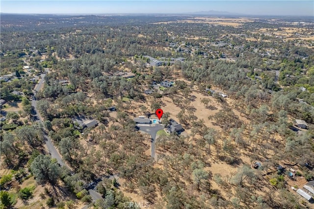 aerial view featuring a view of trees