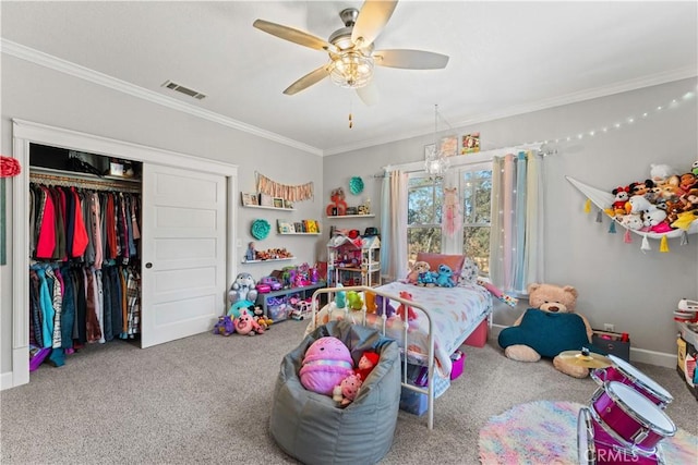 bedroom featuring visible vents, carpet, a closet, and ornamental molding