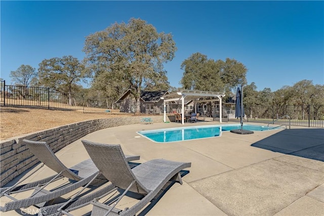 view of swimming pool with a patio area, a fenced in pool, a pergola, and fence