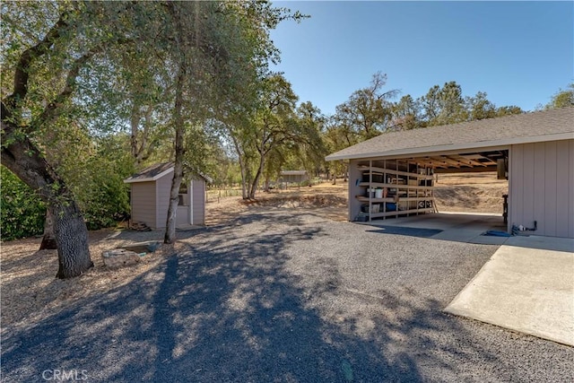 exterior space featuring an outbuilding