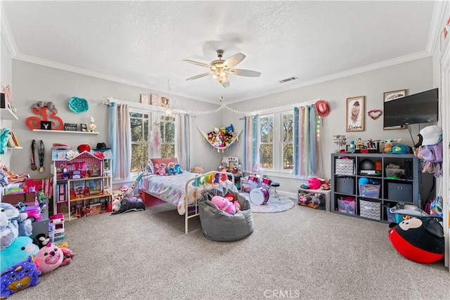 carpeted bedroom with visible vents, a textured ceiling, crown molding, and ceiling fan