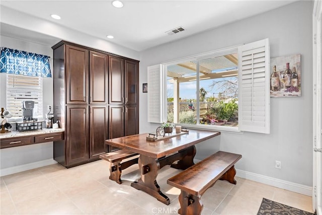 dining area featuring recessed lighting, baseboards, visible vents, and light tile patterned floors