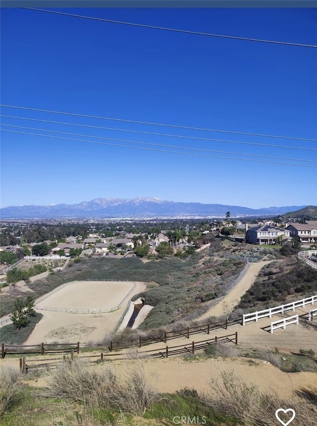 view of mountain feature with a rural view