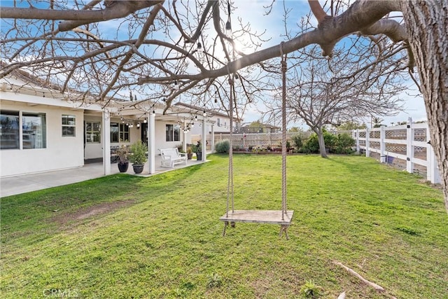 view of yard with a patio and a fenced backyard