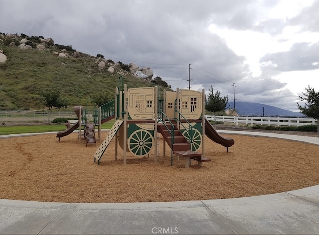 community play area featuring fence