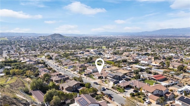 aerial view featuring a mountain view and a residential view