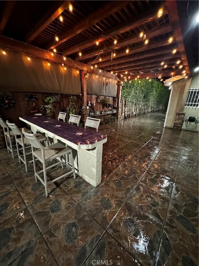 view of patio / terrace with outdoor dining space and outdoor dry bar