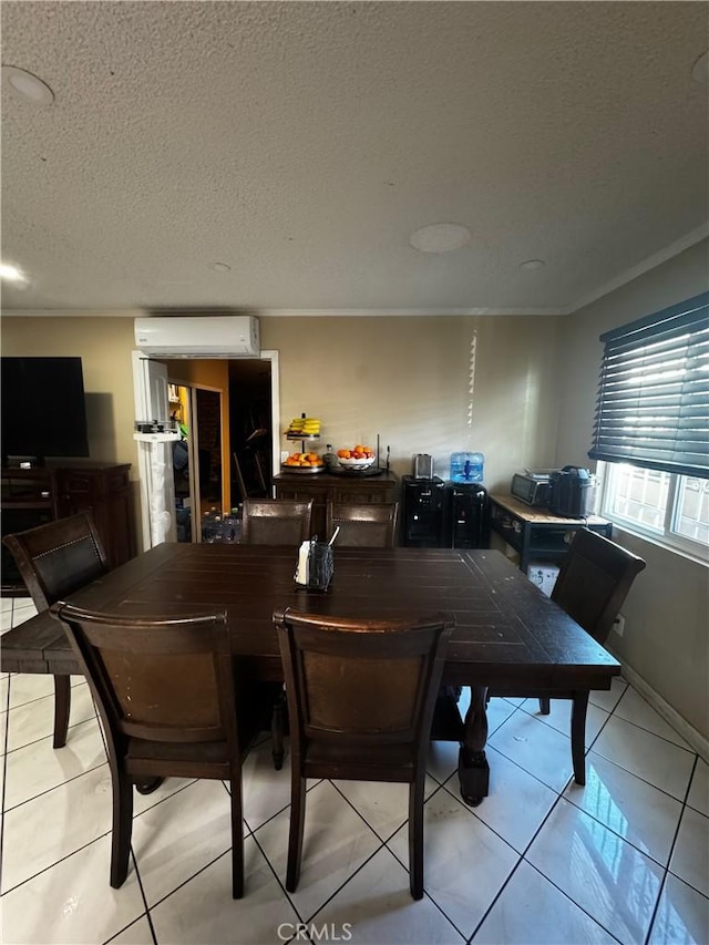 dining space featuring a textured ceiling, crown molding, light tile patterned flooring, and a wall mounted AC