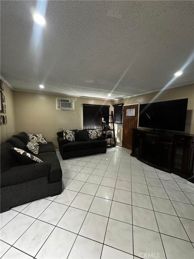 living area featuring light tile patterned floors, recessed lighting, a wall mounted air conditioner, and a textured ceiling