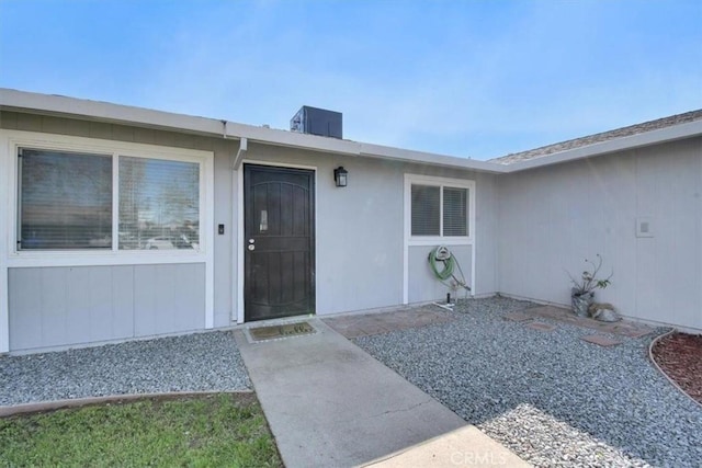 property entrance with central AC unit