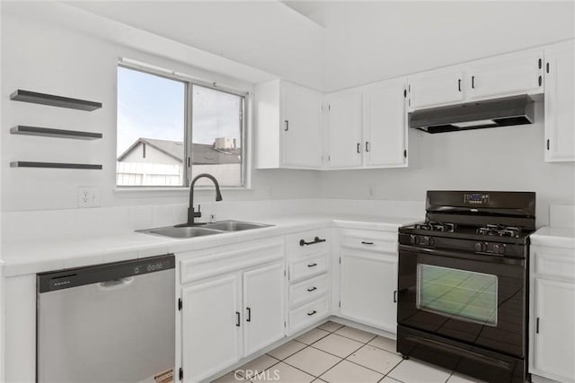 kitchen with white cabinets, black gas range oven, under cabinet range hood, dishwasher, and a sink