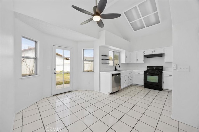 kitchen with black gas range oven, under cabinet range hood, light countertops, dishwasher, and a sink