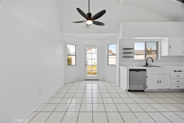 2100 Butterfield Ave, Bakersfield, CA 93304 - kitchen with stainless steel dishwasher, a sink, light countertops, white cabinets, and a ceiling fan