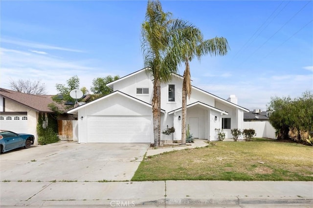 view of front facade featuring fence, driveway, an attached garage, stucco siding, and a front lawn