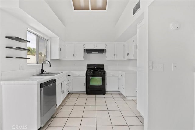 kitchen featuring stainless steel dishwasher, a sink, visible vents, black range with gas cooktop, and under cabinet range hood